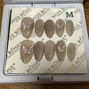 Elegant Brown Press-On Nails with Snowflake Design